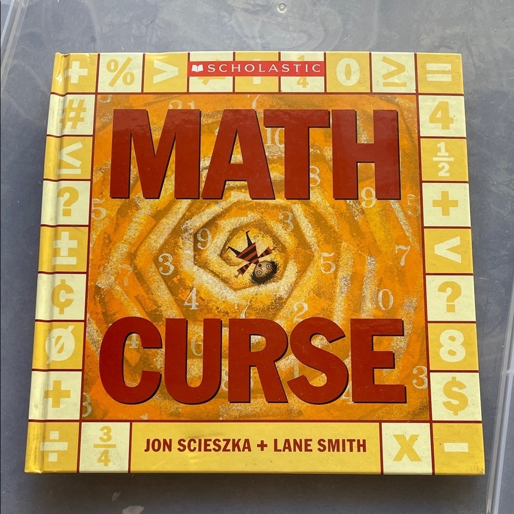 Scholastic Math Curse Book with Orange and Yellow hard Cover